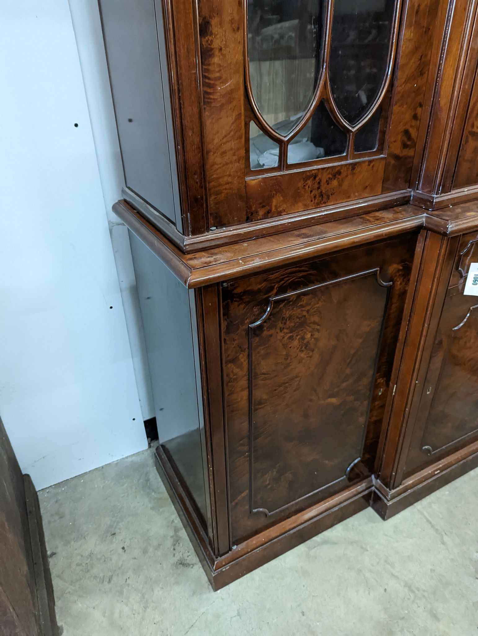 A Victorian style walnut breakfront library bookcase, length 168cm, depth 46cm, height 219cm